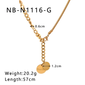Detailed view of 18k gold plated necklace featuring Cuban and snake chains with Good Luck charm