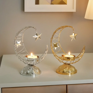 Golden and silver crescent moon metal incense holders with hollow patterns and stars