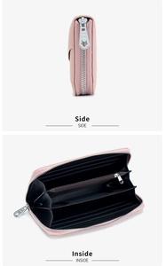 Internal view of pink leather accordion wallet with card slots and metal star zipper
