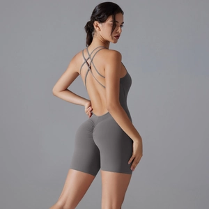 Close-up of open back cross-strap design on a grey yoga bodysuit for body shaping