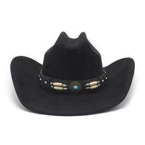 Detailed view of western cowboy hat with turquoise beads and star emblem on band