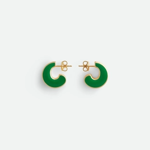 Chic 18K gold-plated C-shape stud earrings with green enamel finish on a light background