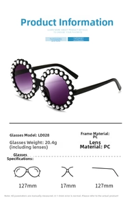 Detail view of round frame kids sunglasses with floral rhinestone decor and PC material specs
