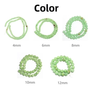 Detail of natural green Afghan jade round beads in 4mm to 12mm sizes for DIY jewelry