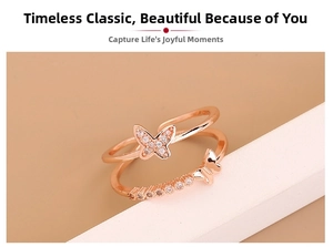 Detail of rose gold butterfly ring with micro-pave zircons on a white display stand