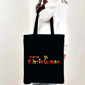 Black Merry Christmas canvas tote bag with festive candy cane and holly design for holiday