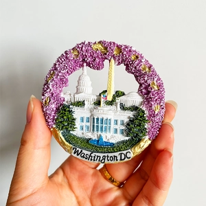 Detailed view of 3D Washington DC fridge magnet with purple cherry blossoms and icons