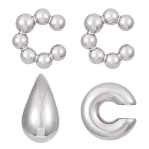 Macro view of four-piece silver water drop textured ear cuffs and stud earring set