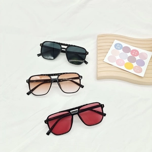 Square fashion sunglasses with black frames and yellow ocean lenses for men and women