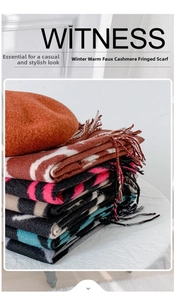 Macro detail of winter warm faux cashmere scarves with fringe and striped pattern