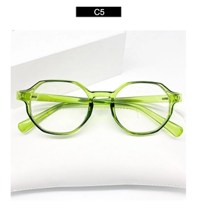 Close-up of stylish transparent emerald green irregular frame glasses with white case