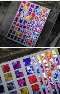Macro detail of EM-003 nail art stickers featuring abstract ink gradient and metallic patterns