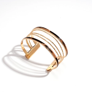 Bracciale rigido multistrato dorato con stampa leopardata geometrica e trama a perline