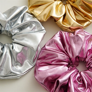 Metallic large scrunchies in gold silver and pink with pleated mirror finish texture