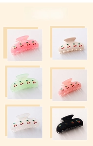 Six different colors of sweet cherry hair claws arranged in a 2x3 matrix display