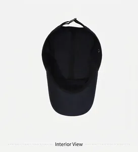 Detailed interior view showing the stitching of a quick-dry breathable navy baseball cap