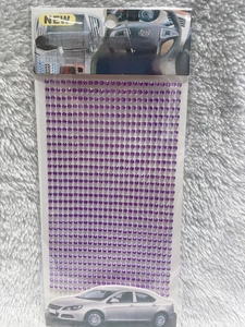 Detail of purple 3mm round self-adhesive acrylic rhinestones in clear packaging