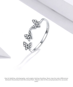 Macro view of S925 sterling silver butterfly ring with shimmering zircon stones