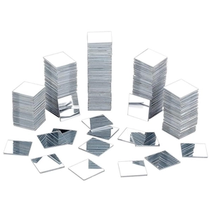 Stack of small square silver acrylic mirror wall tiles for DIY home decor and crafts