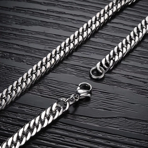 Polished silver 304 stainless steel chain necklace with lobster clasp on wood background
