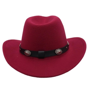Detail of burgundy wool cowboy hat with black leather band and silver vintage metal buckles