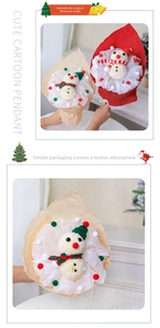 Close-up of handmade snowman flower bouquet kit with red and green Christmas accessories