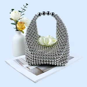 Handmade silver beaded pillow handbag with silk drawstring liner for evening fashion style
