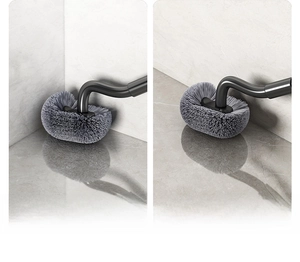 Detail of S-shaped long handle toilet brush cleaning narrow bathroom wall corners