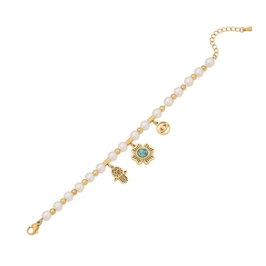 Handmade pearl flower bracelet with Hamsa hand and evil eye charms on white background