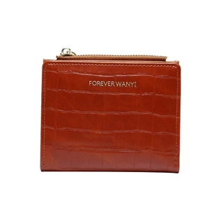 Short brown crocodile pattern leather wallet for women with golden zipper and slim design