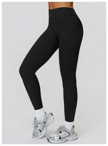 Vue détaillée du legging de yoga à taille haute avec couture en V et tissu extensible mat
