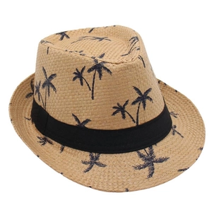 Detailed close-up of woven straw fedora with blue coconut tree print and black band