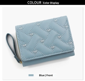 Detail of light blue tri-fold wallet with heart embroidery and woven texture