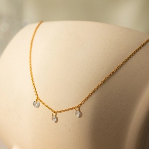 18k gold plated stainless steel necklace featuring three clear teardrop zircon pendants