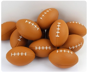 Macro view of brown foam mini footballs showing detailed litchi texture and white stitching