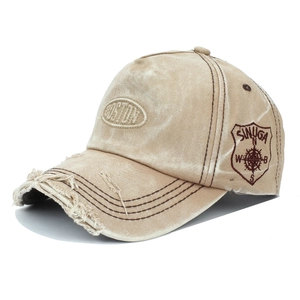 Distressed khaki Boston baseball cap with vintage embroidery and frayed brim detail