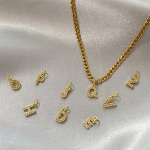 Gold-plated stainless steel necklace with sparkling zircon heart-shaped letter pendants