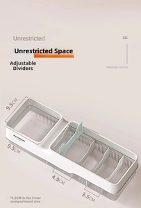 Macro view of white cable storage box featuring adjustable dividers and clear plastic lid