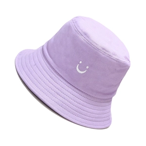 Lavender purple cotton bucket hat featuring a white embroidered smiley face on white background