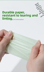 Close-up of flexible plant fiber oil-blotting paper sheets with smooth texture