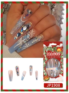 Detailed view of Christmas press-on nails with snowflake art and rhinestone accents