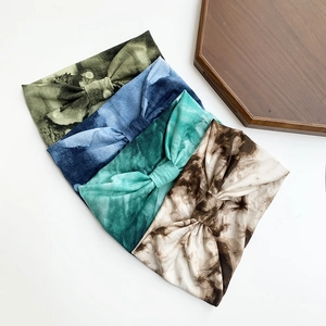 Set of 4 tie-dye yoga headbands in green, blue and brown with a stylish front knot design