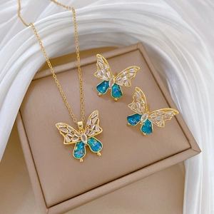 Titanium steel jewelry set featuring a blue bow butterfly necklace and stud earrings