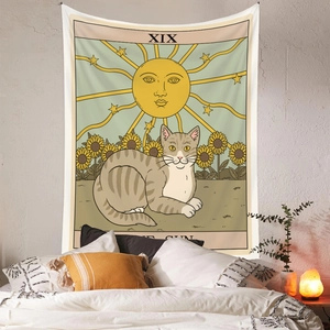 Close-up detail of Bohemian The Sun Tarot cat tapestry hanging on a cozy bedroom wall