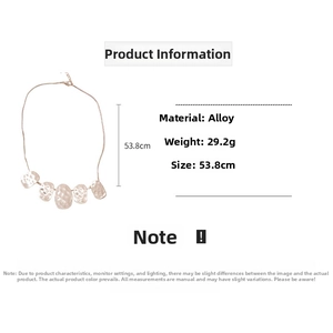 Detail of metallic textured oval pendant necklace with 53.8cm length and alloy material