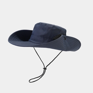Detail of navy wide brim fishing hat featuring ripstop fabric and breathable side mesh