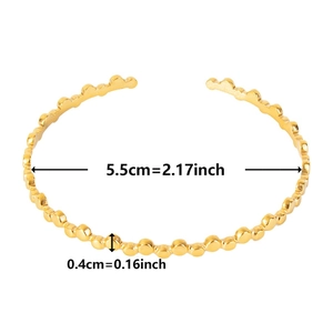 Detailed size view of gold wavy C-shape stainless steel bracelet with 5.5cm inner diameter