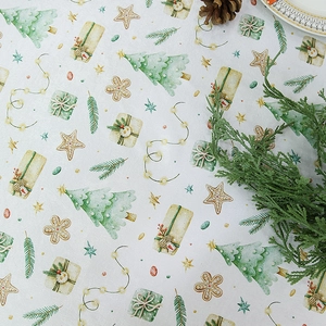 Christmas tablecloth with waterproof festive patterns of trees and gingerbread on white fabric
