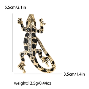 Golden enamel lizard brooch with sparkling rhinestones and dimension specs display
