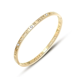 Minimalist 18k gold plated stainless steel bangle with Roman numerals and cubic zirconia